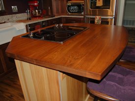 Pecan face grain grain custom wood island countertop.