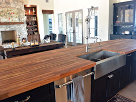 Reclaimed Boxcar Flooring edge grain wood island countertop with Tung-Oil finish.