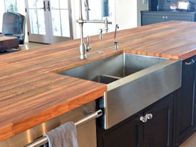 Reclaimed Boxcar Flooring edge grain wood island countertop with Tung-Oil finish.