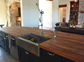 Reclaimed Boxcar Flooring edge grain wood island countertop with Tung-Oil finish.