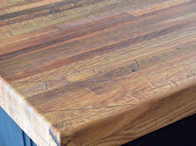 Reclaimed Boxcar Flooring edge grain wood island countertop with Tung-Oil finish.