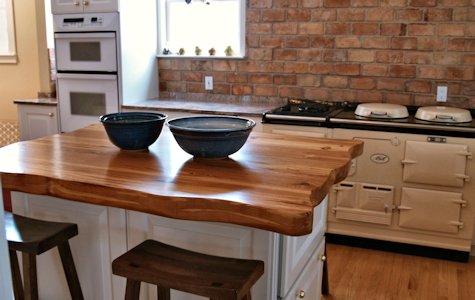 Face Grain Reclaimed Longleaf Pine Wood Island Countertop with Wane Edges