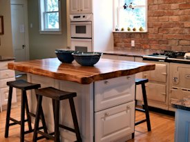 Reclaimed Longleaf Pine face grain custom wood island countertop.