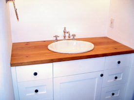 Reclaimed Longleaf Pine face grain custom wood desk top.
