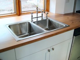 Reclaimed Longleaf Pine face grain custom wood countertop.