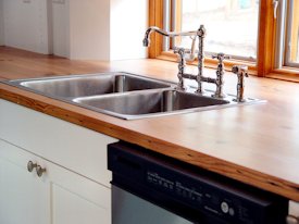 Reclaimed Longleaf Pine face grain custom wood countertop.