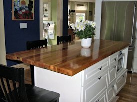 Reclaimed Longleaf Pine face grain custom wood island countertop.