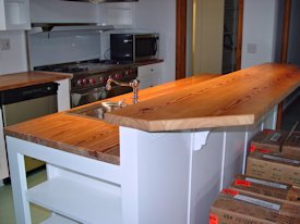 Reclaimed Longleaf Pine face grain custom wood counter top and bar top.
