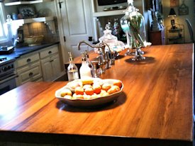 Reclaimed Longleaf Pine face grain custom wood island countertop.