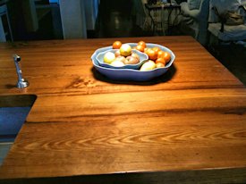 Reclaimed Longleaf Pine face grain custom wood island countertop.