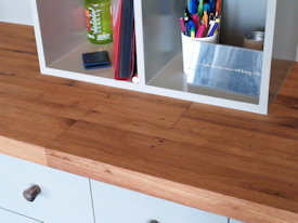 Reclaimed White Oak custom wood desk with DeVos Puzzle Joint along the length.  Finger Joint ends with Waterfall return to the floor and Tung-Oil finish.