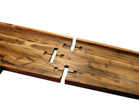 Contemporary Reclaimed White Oak custom wood island with DeVos Puzzle Joint along the length.  Finger Joint ends with Waterfall return to the floor and Tung-Oil finish.