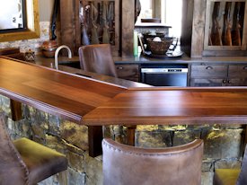 Slab Walnut face grain custom wood bar top.