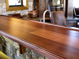 Slab Walnut face grain custom wood bar top.