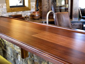 Slab Walnut face grain custom wood bar top.