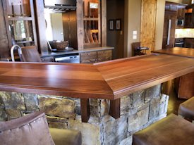 Slab Walnut face grain custom wood bar top.