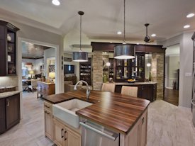 Walnut edge grain wood island countertop.