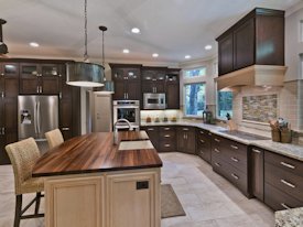 Walnut edge grain wood island countertop.