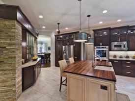 Walnut edge grain wood island countertop.