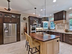 Walnut edge grain wood island countertop.