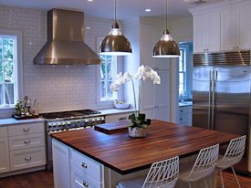 Walnut edge grain wood island countertop.