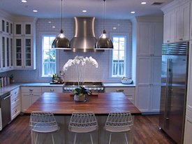 Walnut edge grain wood island countertop.