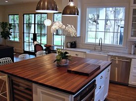 Walnut edge grain wood island countertop.