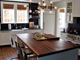 Walnut edge grain wood island countertop.