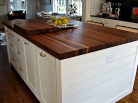 Walnut edge grain wood island countertop.