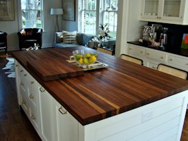 Walnut edge grain wood island countertop.