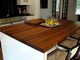 Walnut edge grain wood island countertop.