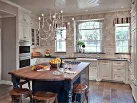 Walnut edge grain wood island countertop.