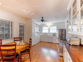 Walnut face grain wood countertops and backsplash.