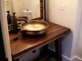 Walnut face grain reproduction wood vanity top and base.