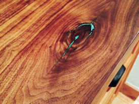 Rustic Walnut face grain countertop with Turquoise Fills and Waterlox Satin finish.