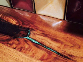 Rustic Walnut face grain countertop with Turquoise Fills and Waterlox Satin finish.