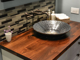 Walnut face grain vanity top with Waterlox Satin finish.