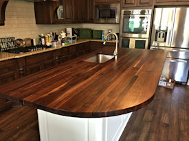 Rustic Walnut edge grain island countertop with Tung-Oil finish.