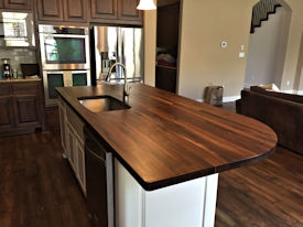 Rustic Walnut edge grain island countertop with Tung-Oil finish.