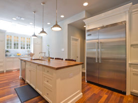 Walnut face grain island countertop with Waterlox Satin finish.