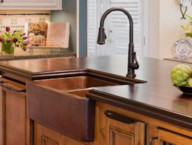 Edge Grain Wenge Island Top with farm sink and Waterlox finish