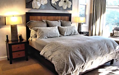 Custom Wenge and Cherry panel bed with matching night stands.