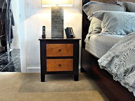 Custom Wenge and Cherry panel bed with matching night stands.