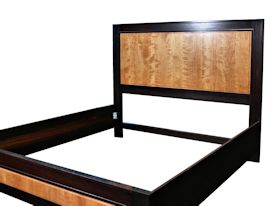 Custom Wenge and Cherry panel bed with matching night stands.