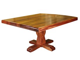 Custom jatoba table with pedestal-style base and drop-edge top.