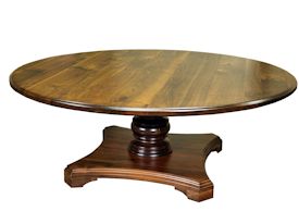 Custom round walnut table with turned pedestal-style base