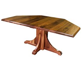 Custom distressed walnut table with pedestal-style base