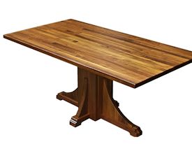 Custom walnut table with pedestal-style base