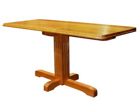 Custom cherry table with fluted pedestal-style base