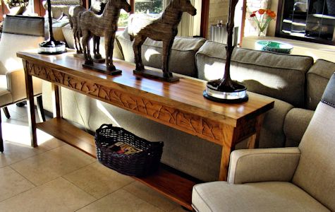 Custom Spalted Pecan sofa table with custom designed carved aprons and shaped shelf.